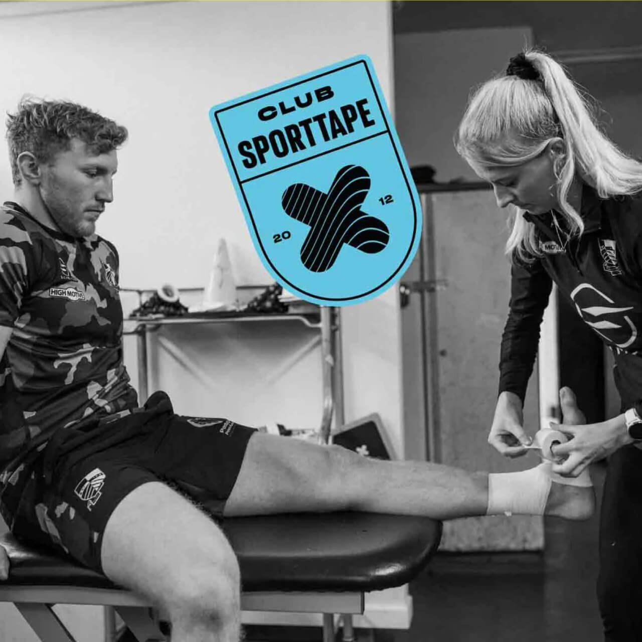 Image of a player getting physio treatment with a 'Club Sporttape' brand sticker